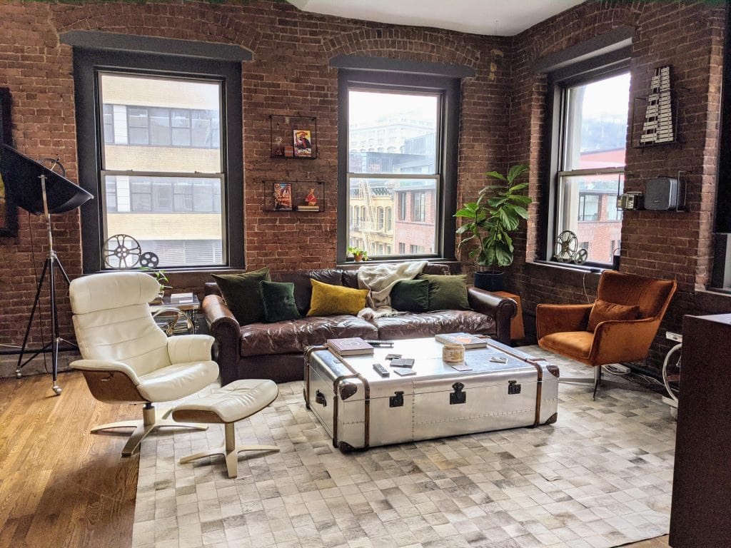 Chrome coffee table in a living room by Decorilla designer, Joyce T.