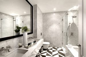 Classic tile drenching trend by Decorilla designer, Joseph G.