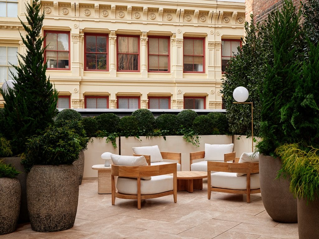 Contemporary city patio by Decorilla designer, Molly I. 