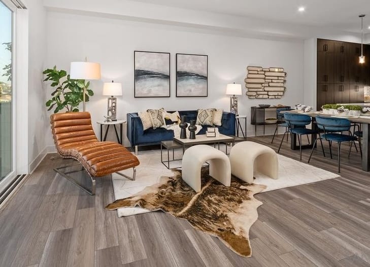 Cow print decor trend in a living room by Decorilla designer, Jacqueline H