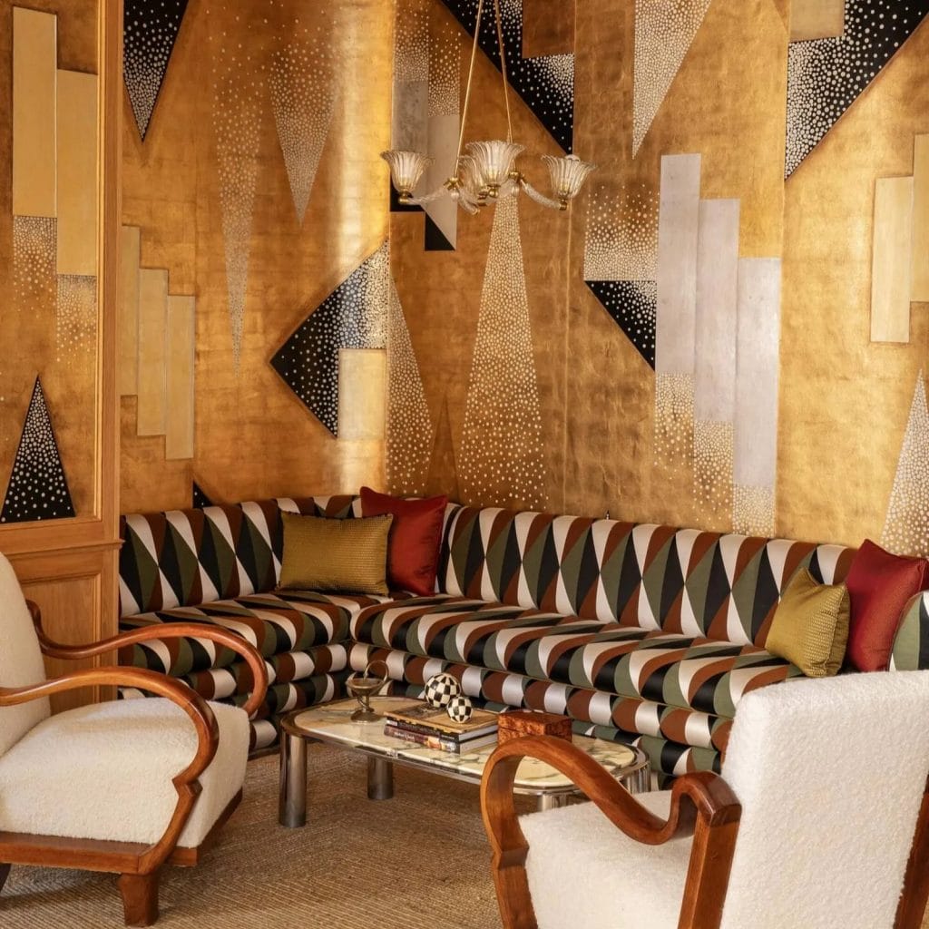 Sharp lines and graphic patterns speak loud luxury in a lounge by Decorilla