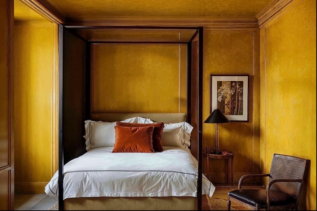 Strong patterns drive the loud luxury trend in an organic bedroom by Decorilla