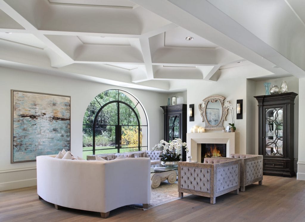Transitional living room with unique coffered ceiling by Decorilla designer, Kelli E. 