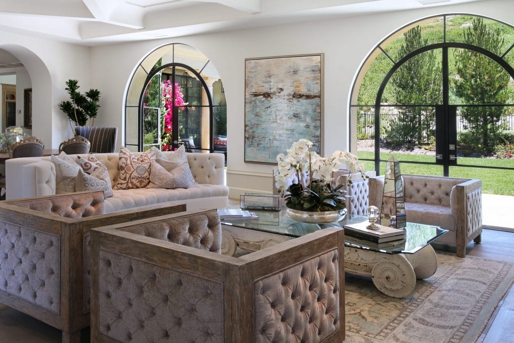 living room with modern old world decor by DECORILLA designer Kelli E. 