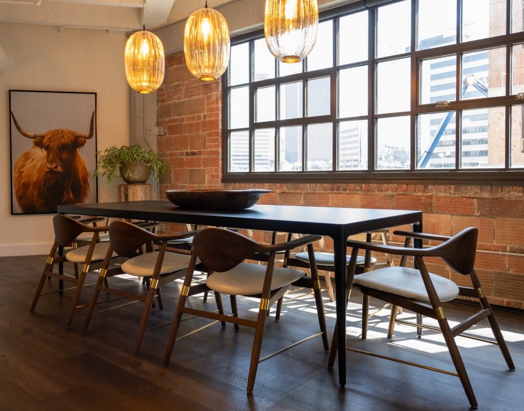 Contemporary dining room with modern country style decor by DECORILLA designer, Lisa F.
