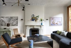 Eclectic living room with a modern classic interior design by DECORILLA designer, Catherine W.