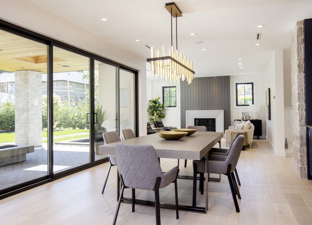 Contemporary dining room lighting trends 2026 by DECORILLA designer, Dina H.