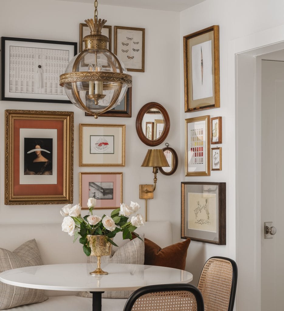 Eclectic dining room with feminine room decor by DECORILLA designer, Christina M..jpg