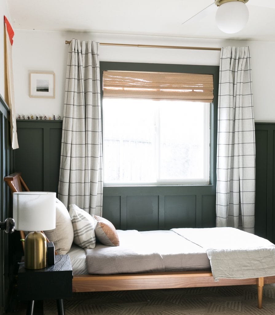 Modern farmhouse bedroom for a boy by Decorilla designer Amanda J