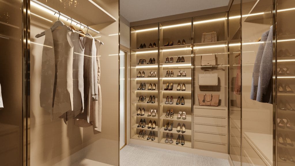 Her closet in a primary bedroom suite by Decorilla