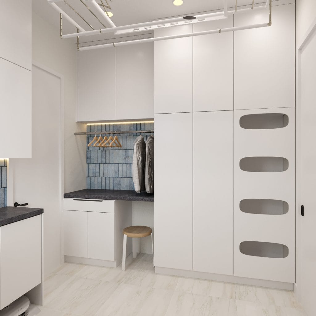 Laundry room design in a productive home by Decorilla