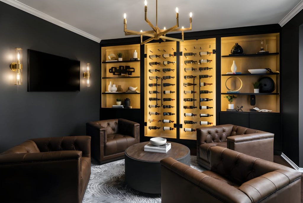 Relaxation area in a moody home office interior by Decorilla designer, Kaitlyn B.