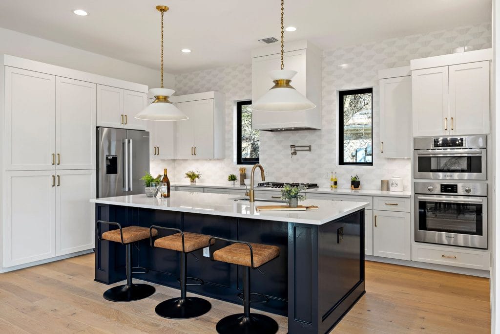 Transitional big kitchen island with seating by DECORILLA designer, Amy A.