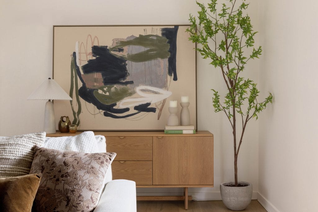 Eclectic comfort maxxing living room by DECORILLA designer, Megan W.