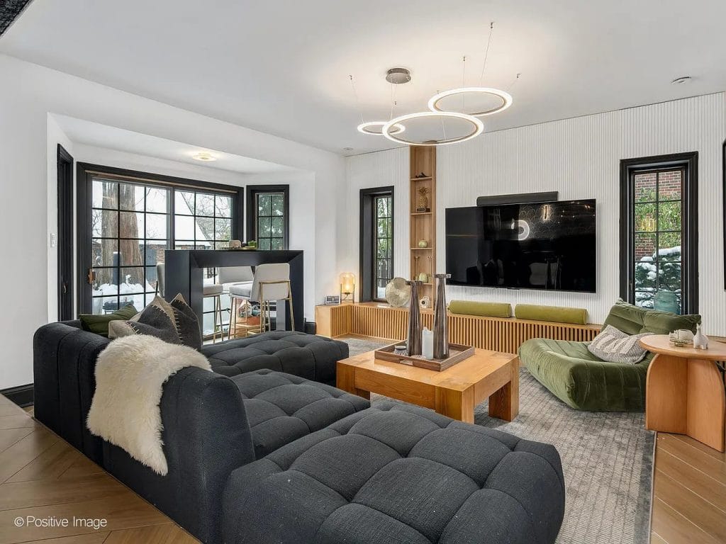 Family room in a historical home, by Decorilla