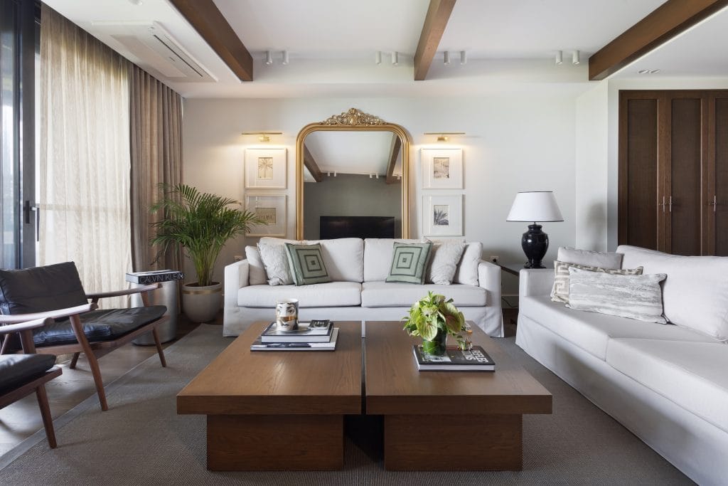 Curated, transitional living room by Decorilla designer Meric S.