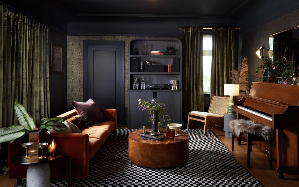 Eclectic living room in vibrant earth colors by DECORILLA designer Bridget B.