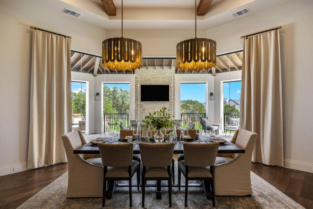 Skirted dining room chairs in a timeless layout by Decorilla designer, Erica G.