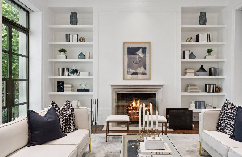 White contemporary living room in a luxury home by Decorilla designer, Autumn P.