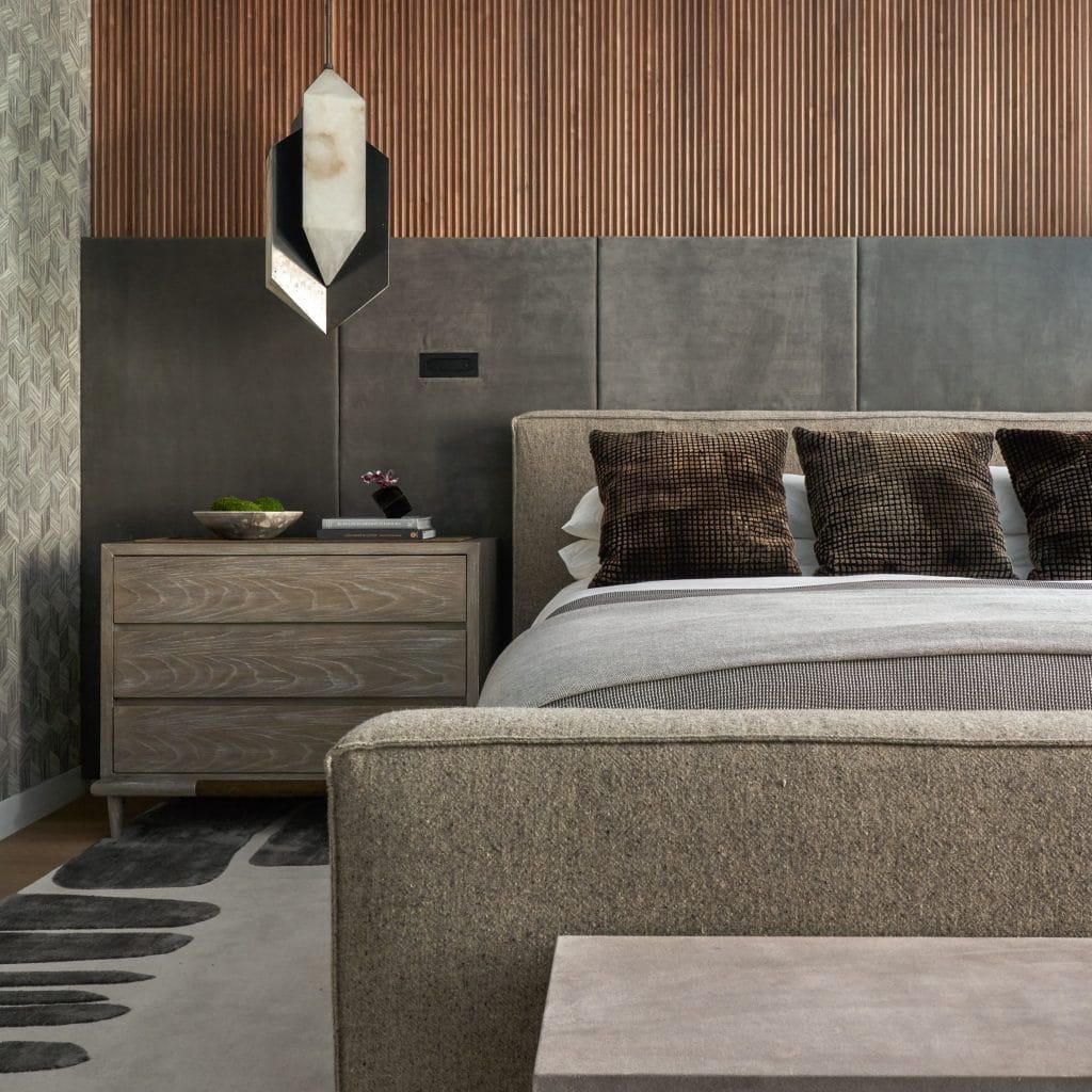 Fluted panels reinforcing the aesthetics of the bedroom by Decorilla designer, Theresa W.