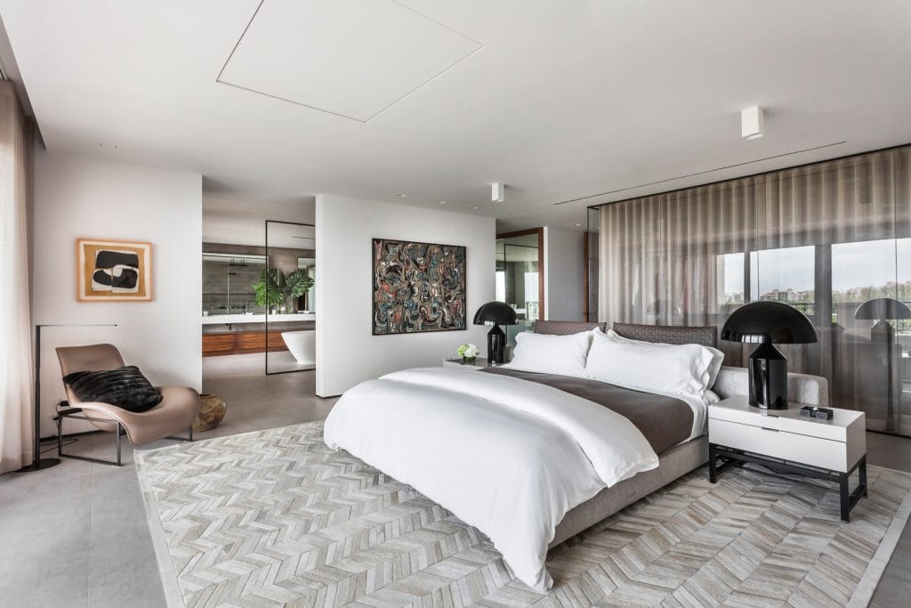 Large bedroom by Decorilla's new construction interior designer, Desiree V.