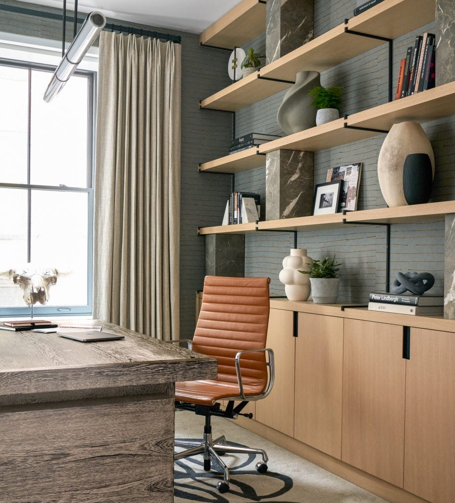 Home office with a curated background by Decorilla designer, Teresa W. 