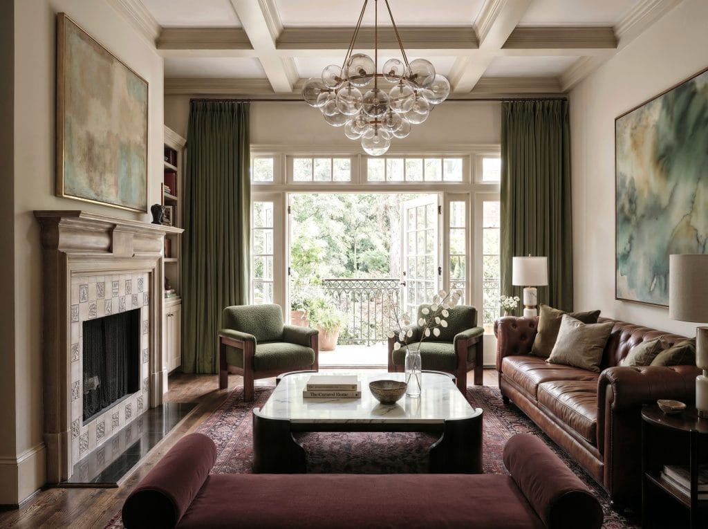 Warm earthy transitional living room by Decorilla