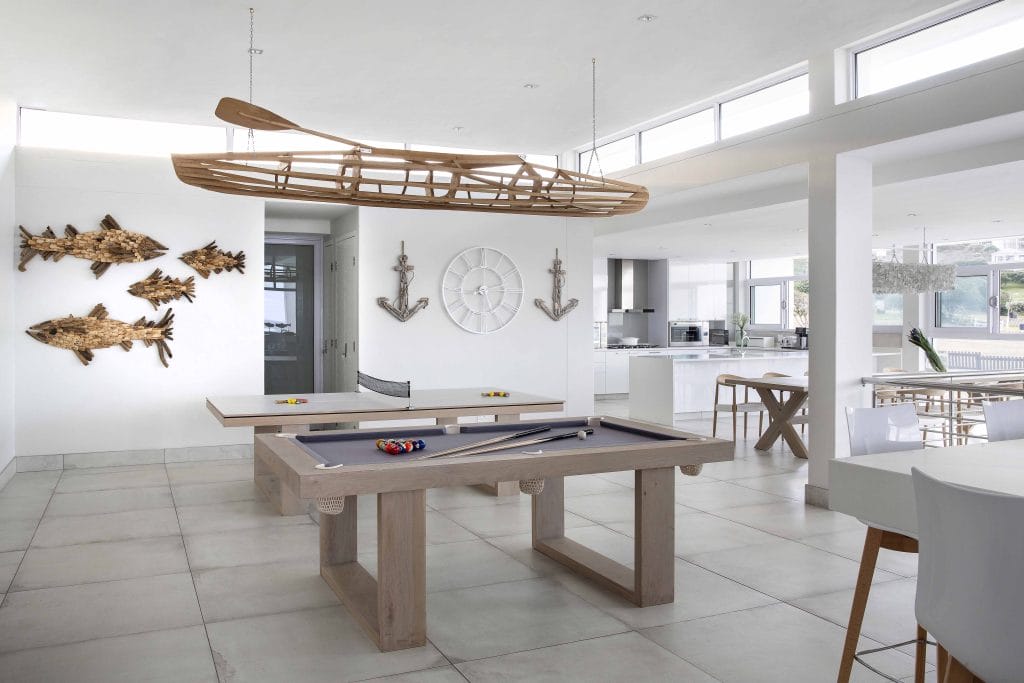 Artisanal chandelier in a game room by Decorilla designer, Anna C.