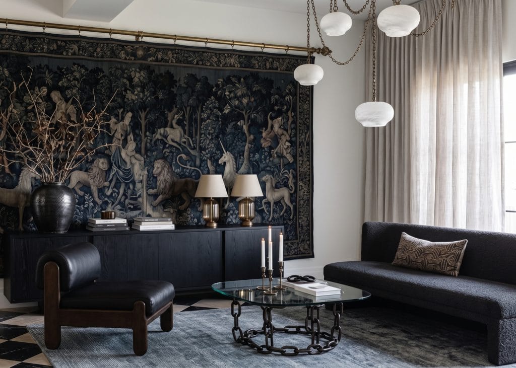 Curated pieces instead of tacky home decor matching in a living room by Decorilla