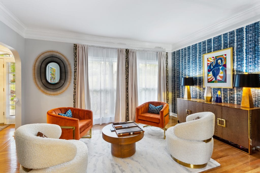 Eclectic conversation area turned a game room, trendy living room interior by Decorilla designer, Sierra W.